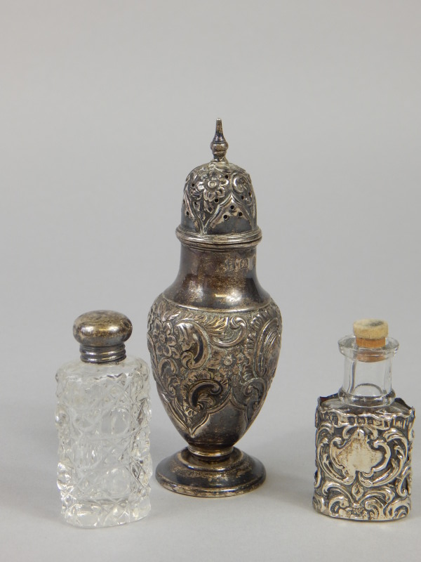 Appraisal: A late Victorian silver baluster shaped pepper pot with embossed