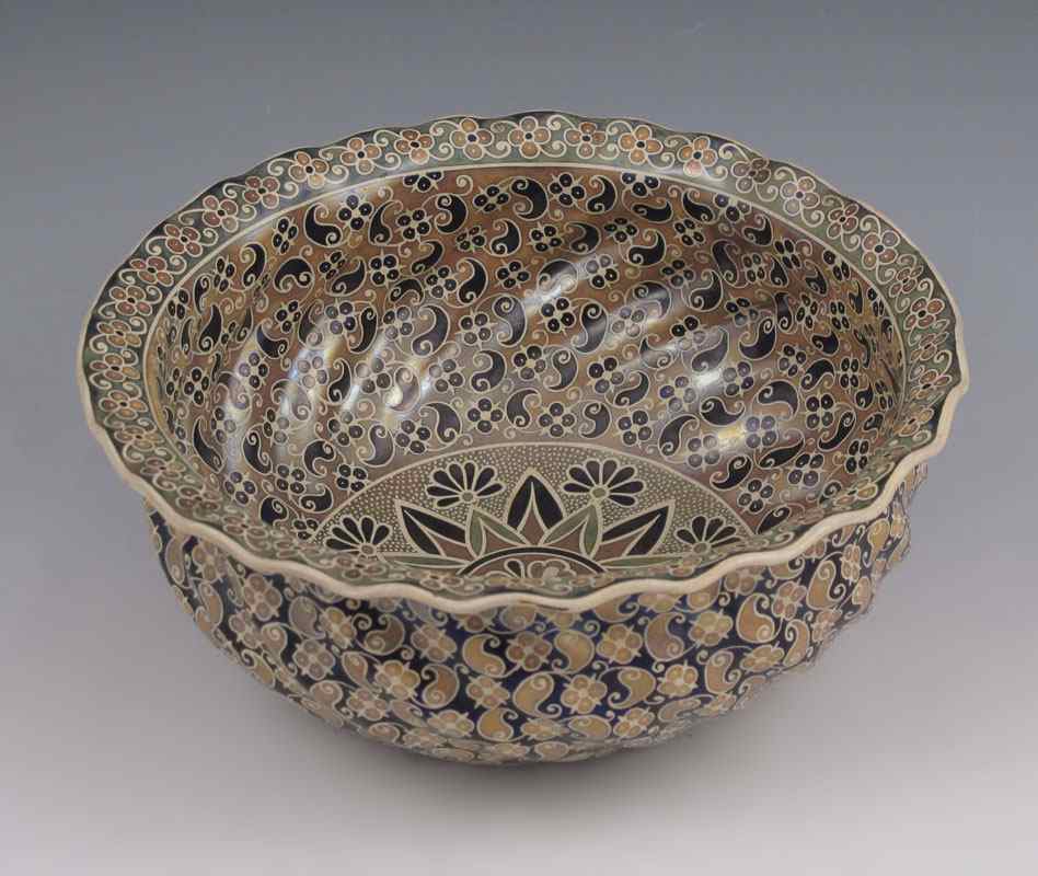 Appraisal: ZSOLNAY HUNGARIAN POTTERY BOWL Pecs Hungary All over paisley design