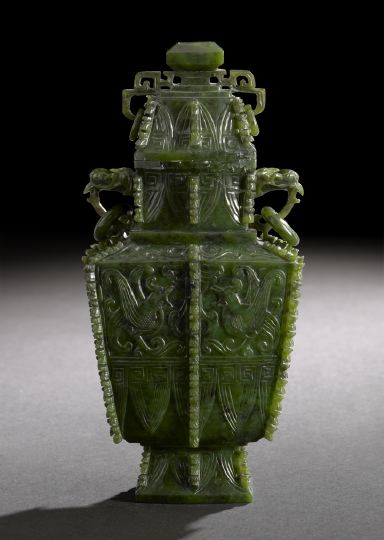 Appraisal: Elaborate Chinese Carved Spinach Jade Covered Vase after a Shang