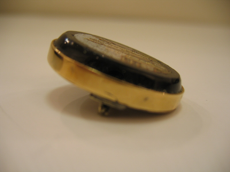 Appraisal: MICRO MOSAIC Oval pin with onyx set with ancient city