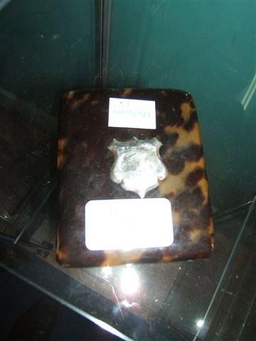 Appraisal: A tortoiseshell cigarette case with silver mounted crest x