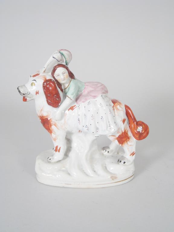 Appraisal: A th Century Staffordshire Figure of a young girl riding