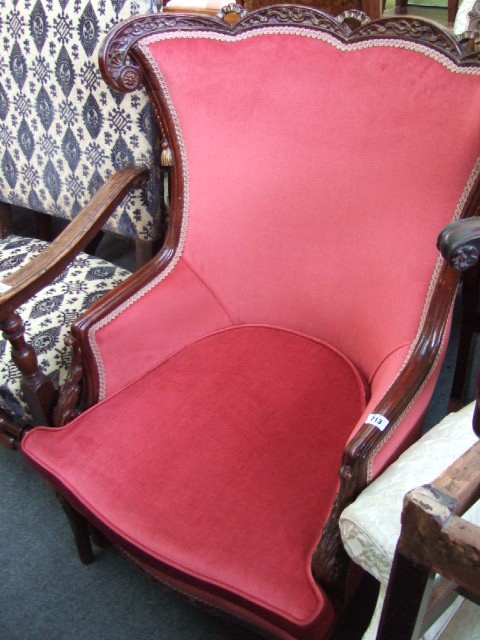 Appraisal: A late th century mahogany framed armchair with ribbon carved