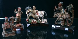 Appraisal: A Han style polychrome painted wood figure damaged together with