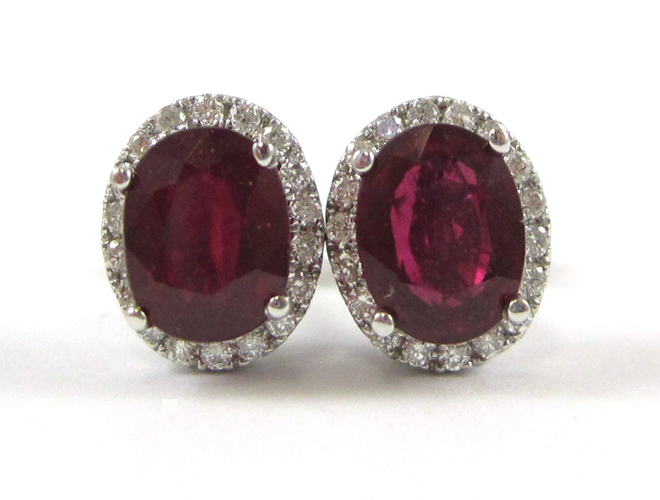 Appraisal: PAIR OF RUBY AND DIAMOND EARRINGS Each k white gold