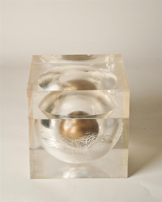 Appraisal: A Lucite Cube Sculpture with hollow orb center cube is