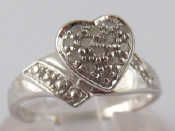 Appraisal: A carat white gold pave set diamond ring with heart