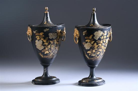 Appraisal: PAIR REGENCY-STYLE BLACK PAINTED AND GILT DECORATED TOLE CHESTNUT URNS