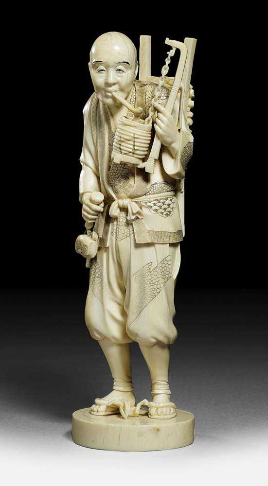 Appraisal: IVORY OKIMONO OF A PIPE SMOKER Japan Meiji-period H cm