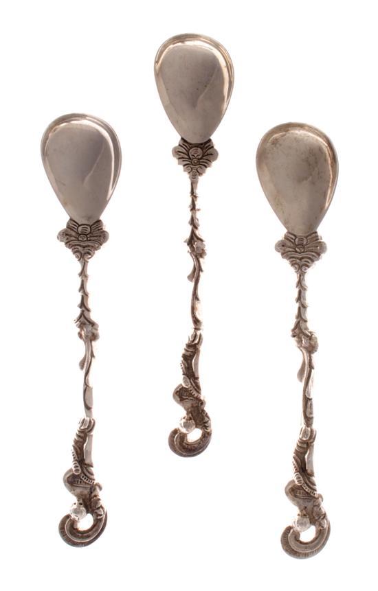 Appraisal: A Set of Three Russian Silver Spoons each with figural