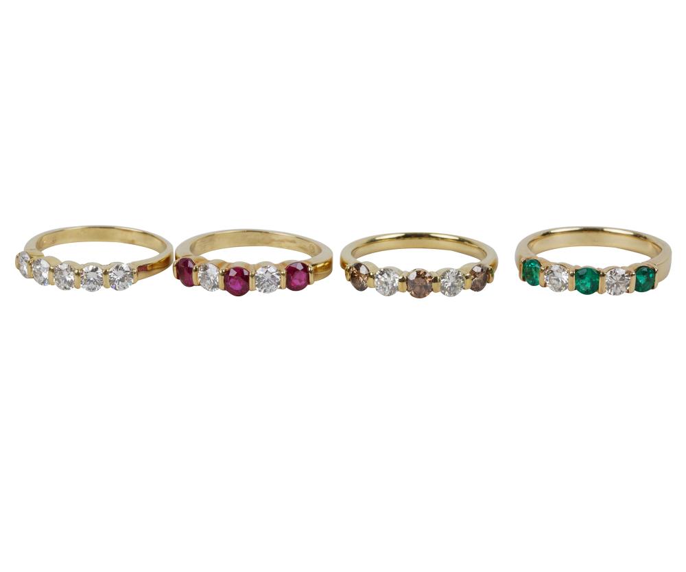 Appraisal: FOUR KARAT YELLOW GOLD DIAMOND GEM-SET STACKING RINGSone containing five