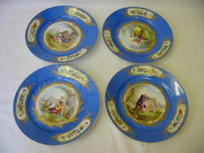 Appraisal: A SET OF FOUR SEVRES PORCELAIN PLATES painted with panels