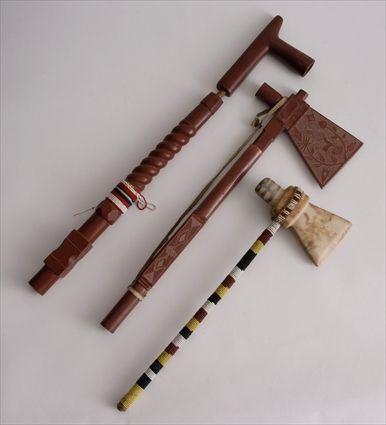 Appraisal: INLAID STONE TOMAHAWK WITH BEADED SHAFT TOGETHER WITH A CATLINITE