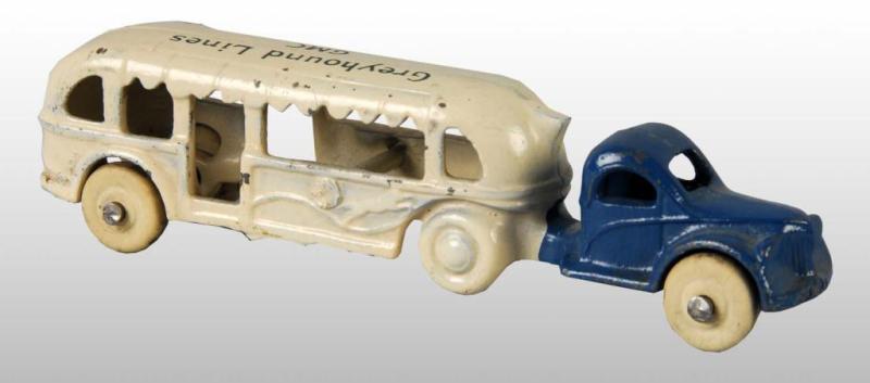 Appraisal: Cast Iron Arcade Greyhound Lines GMC Bus Toy Description American