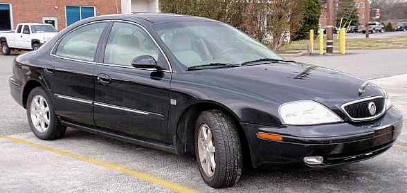 Appraisal: black Mercury Sable LS four-door sedan with leather interior miles