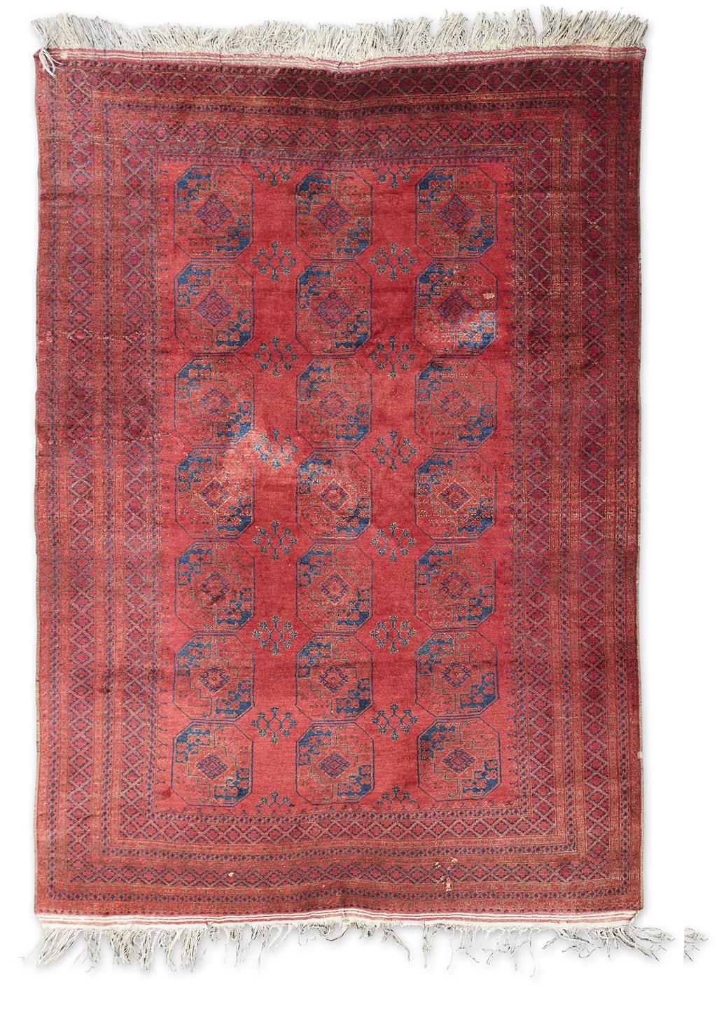 Appraisal: TURKOMAN CARPET TURKMENISTAN TH CENTURY the red field with three