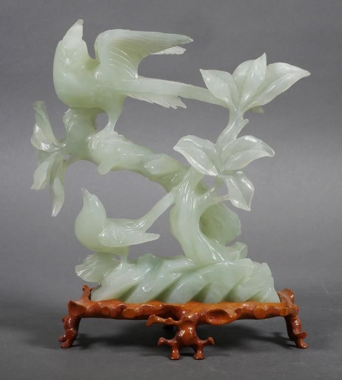 Appraisal: Carved green jade birds figural group with custom carved wood