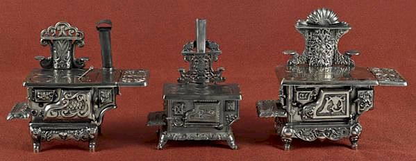 Appraisal: Three cast iron and nickel toy stoves to include Three