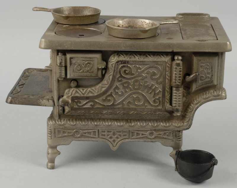 Appraisal: Cast Iron Grey Iron Crown Children's Stove Description Includes accessories