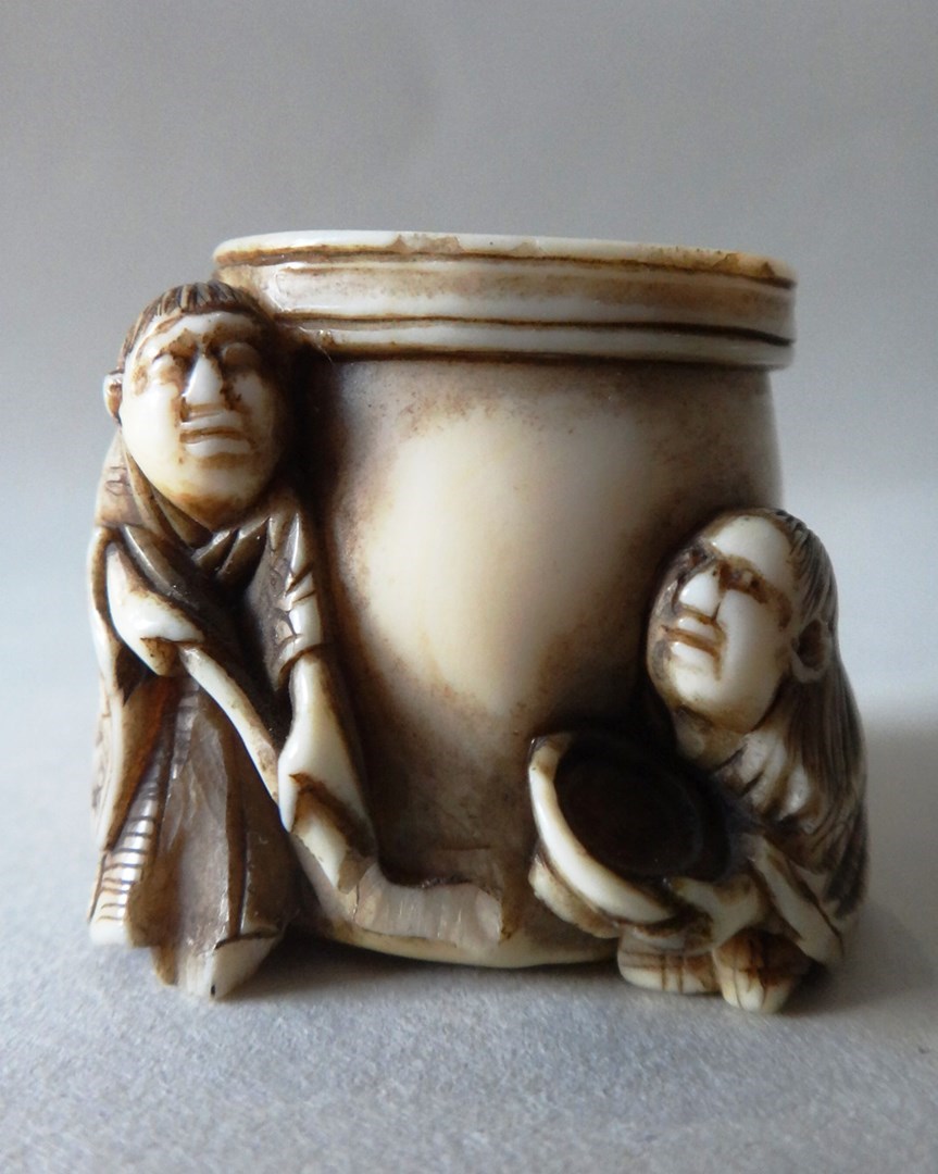 Appraisal: A Japanese ivory netsuke th century carved as three woman