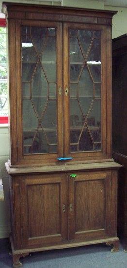 Appraisal: A late th Century bookcase the moulded cornice above a