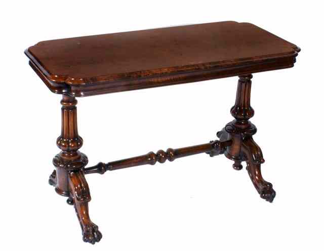 Appraisal: A VICTORIAN WALNUT CENTRE TABLE of rectangular form with fluted