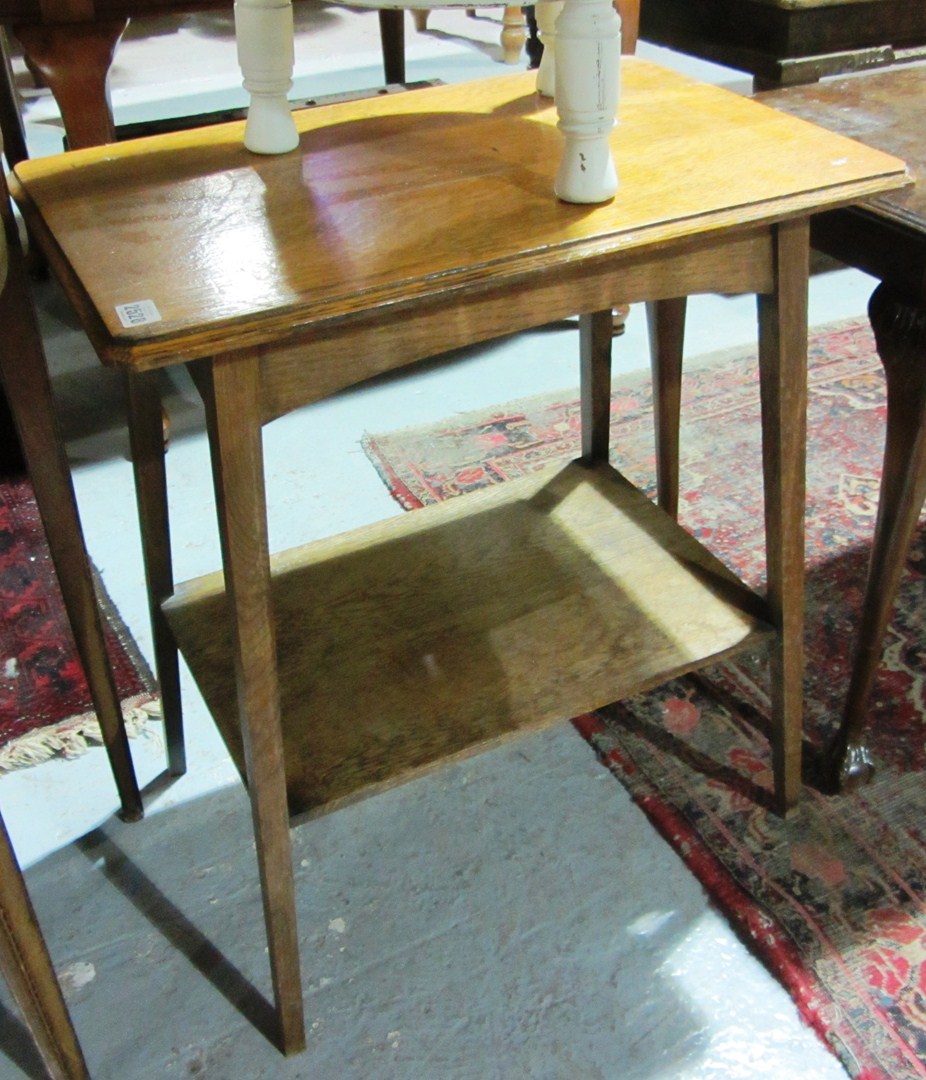 Appraisal: An oak two tier rectangular table