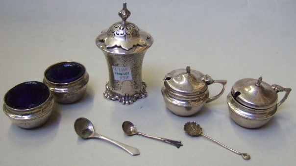 Appraisal: Mostly silver comprising a pair of hinge lidded mustard pots