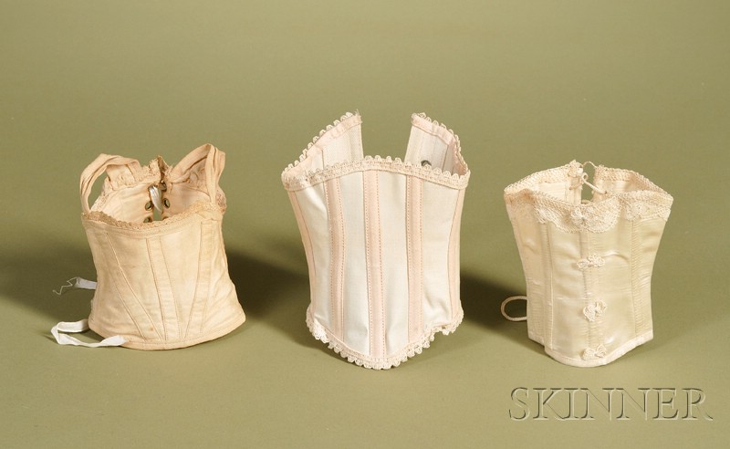 Appraisal: Three Doll Corsets late th century one cream and pink