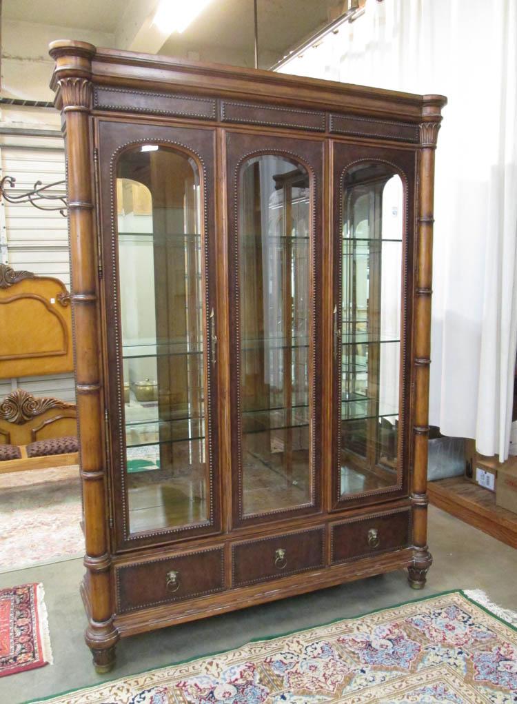 Appraisal: LARGE ILLUMINATED DISPLAY CABINET ON BASE Ferguson Copeland North Carolina