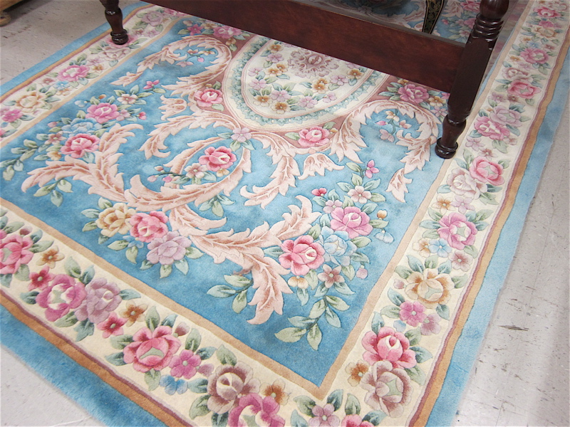 Appraisal: CHINESE CARPET hand knotted in French Aubusson design comprising sculptured