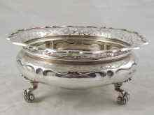 Appraisal: A silver bowl on three leaf capped feet with pierced