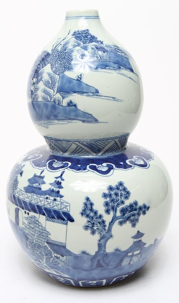 Appraisal: Chinese Porcelain Blue White Gourd-Form Vase Chinese porcelain blue and