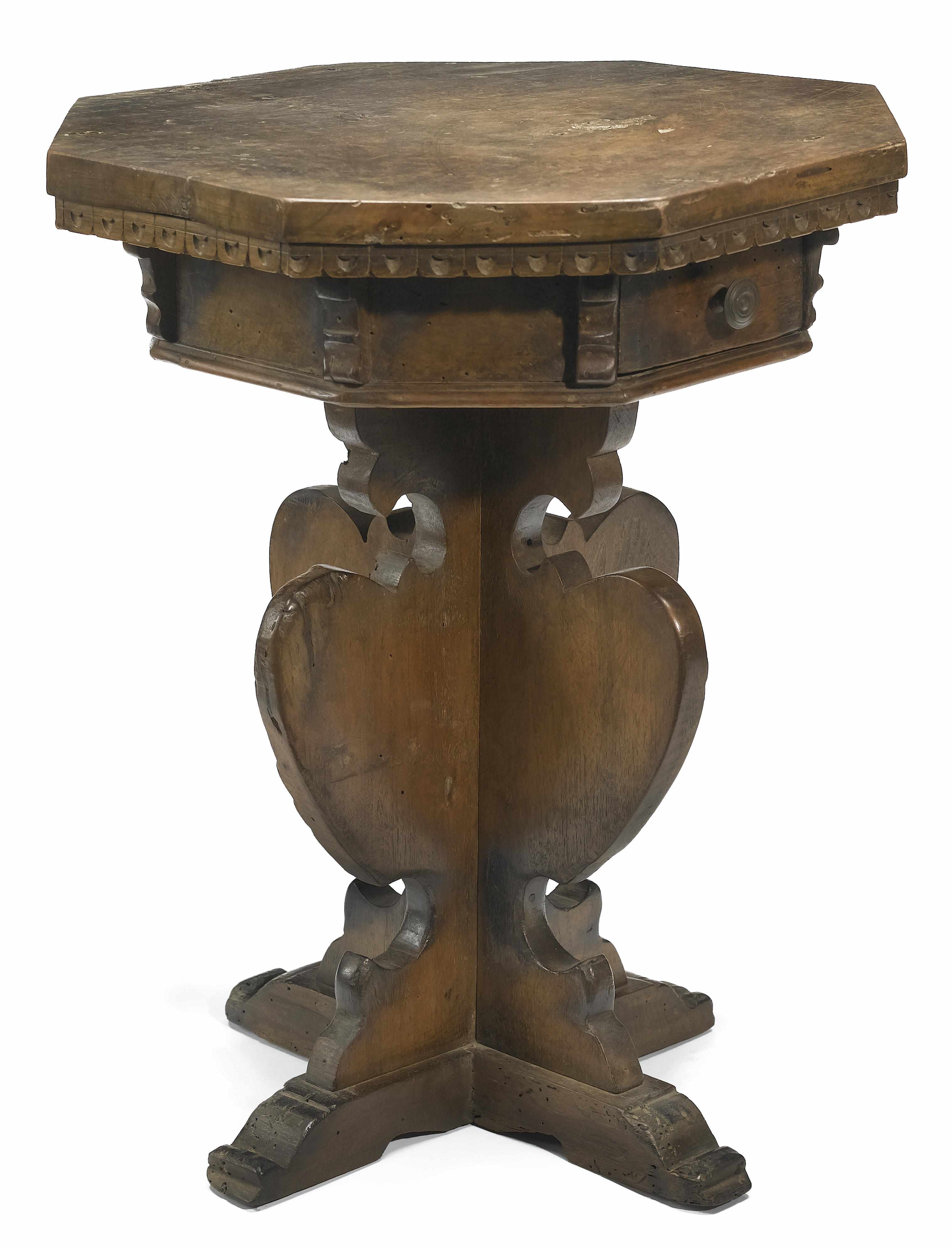 Appraisal: An Italian Baroque style walnut occasional table incorporating antique and