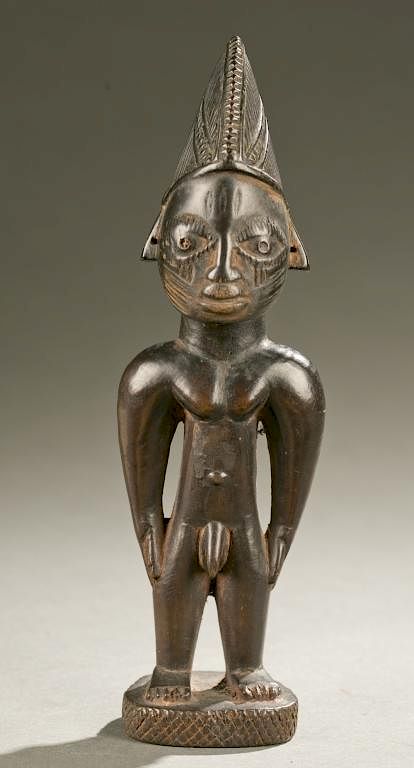 Appraisal: Yoruba male Ibeji figure th c A standing male Ibeji