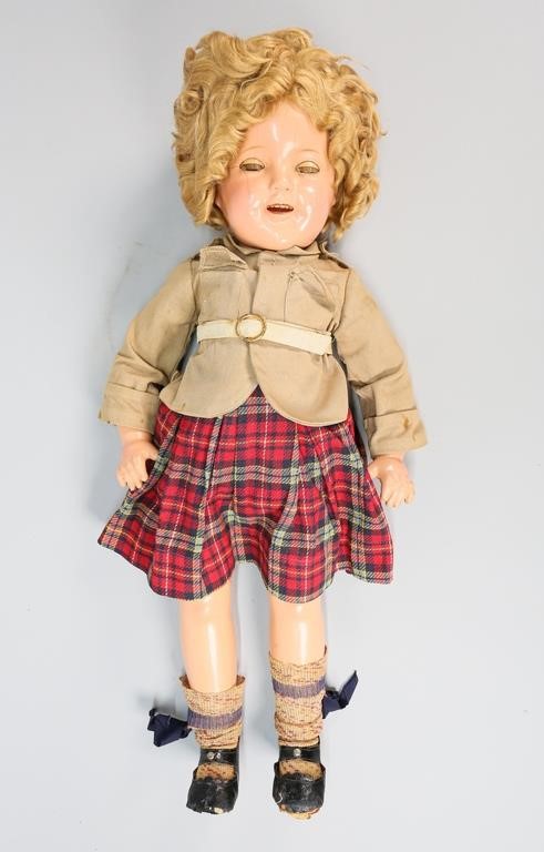 Appraisal: Shirley Temple composition doll Early th Century Stitched fabric clothing