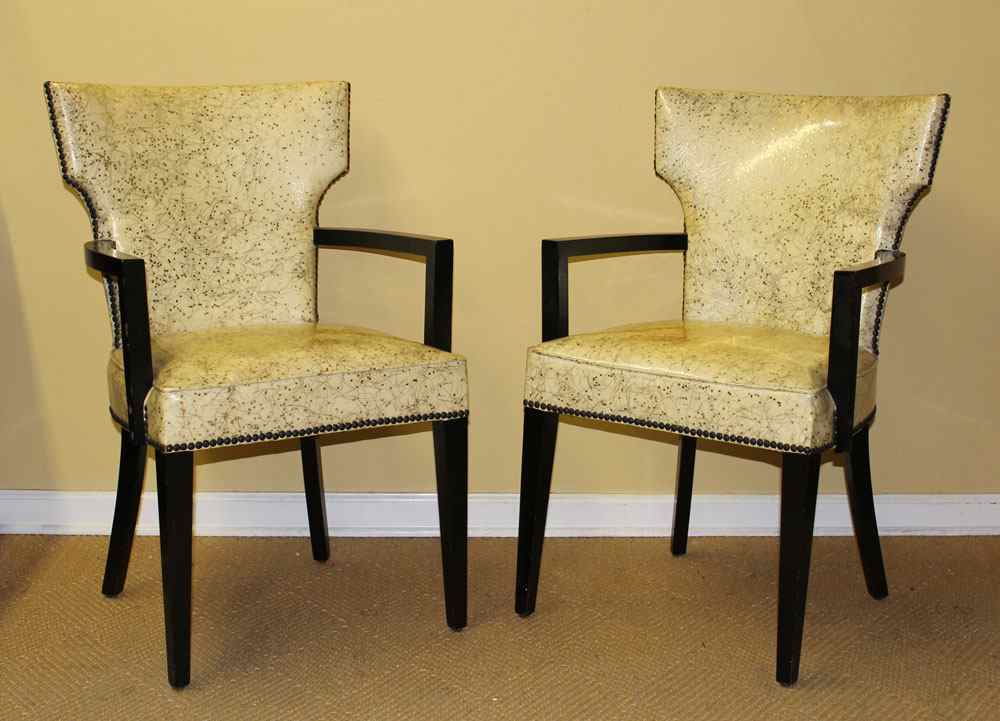 Appraisal: A COOL PAIR OF MIAMI STYLE MID CENTURY ARM CHAIRS