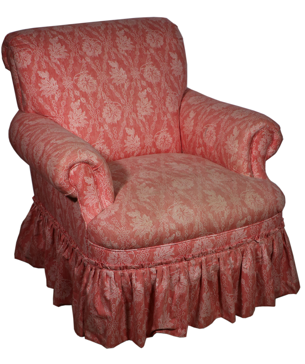 Appraisal: UPHOLSTERED ARMCHAIR Overstuffed upholstered armchair in a salmon colored fabric