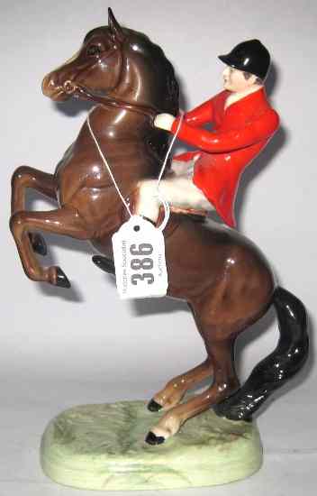 Appraisal: Beswick Model of a Huntsman on Rearing Horse