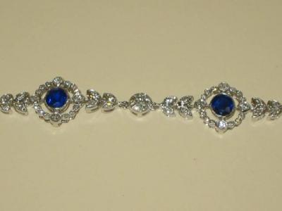 Appraisal: A SAPPHIRE AND DIAMOND BRACELET the oval cut sapphires set