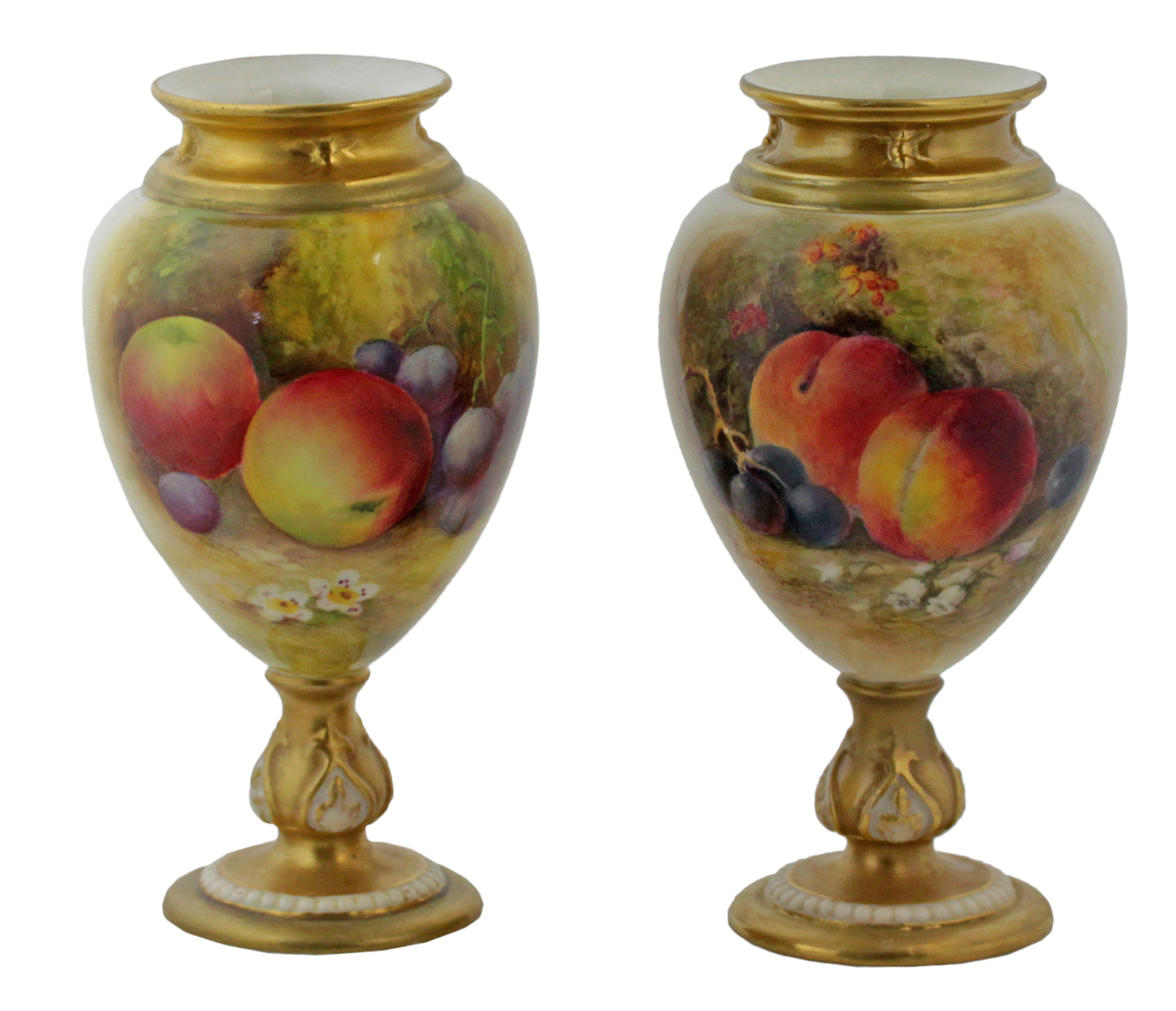 Appraisal: A pair of Royal Worcester pedestal vases each painted apples