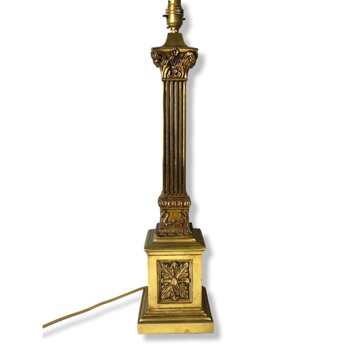 Appraisal: A large Brass Corinthian Column table lamp with stylised floral