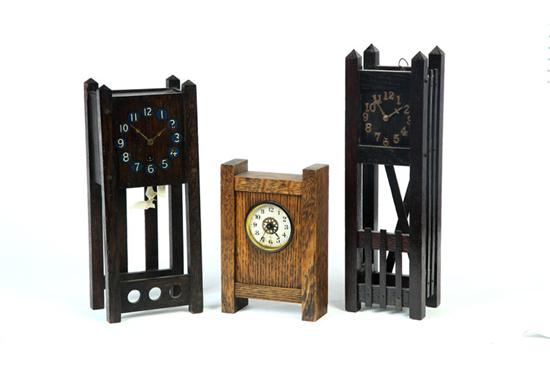 Appraisal: THREE MANTEL CLOCKS American early th century oak Two are