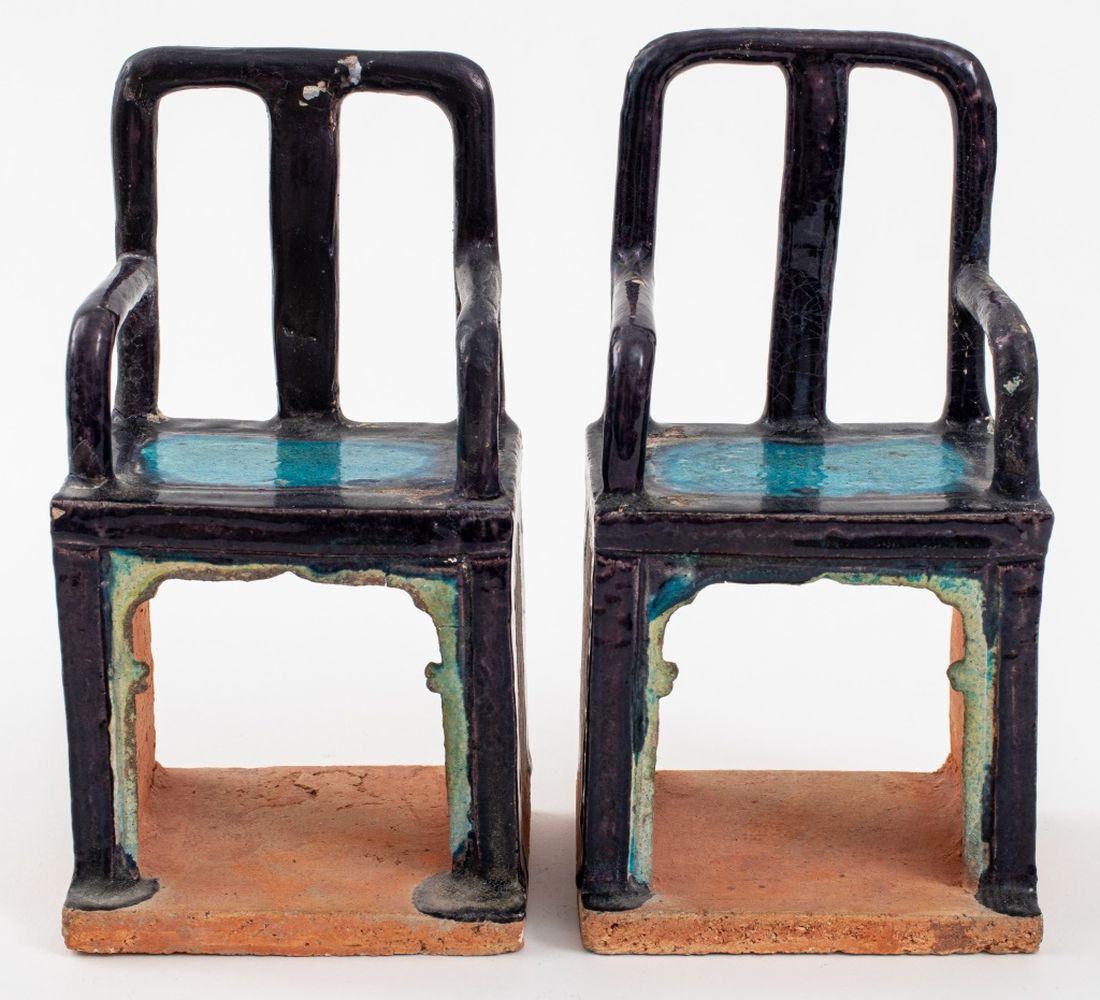 Appraisal: CHINESE GLAZED POTTERY MODELS OF TOMB CHAIRS PAIR Pair of