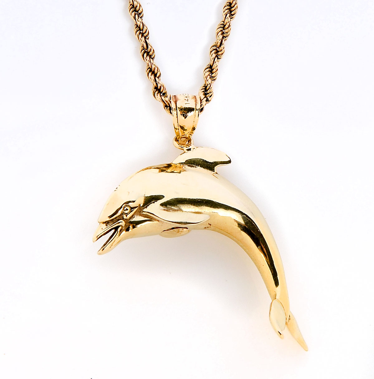 Appraisal: K DOLPHIN PENDANT WITH CHAIN K yellow gold dolphin measures