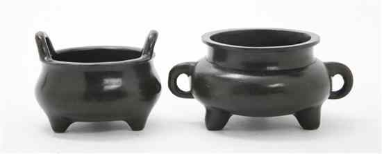 Appraisal: Two Bronze Tripod Censers one with C-form handles at the