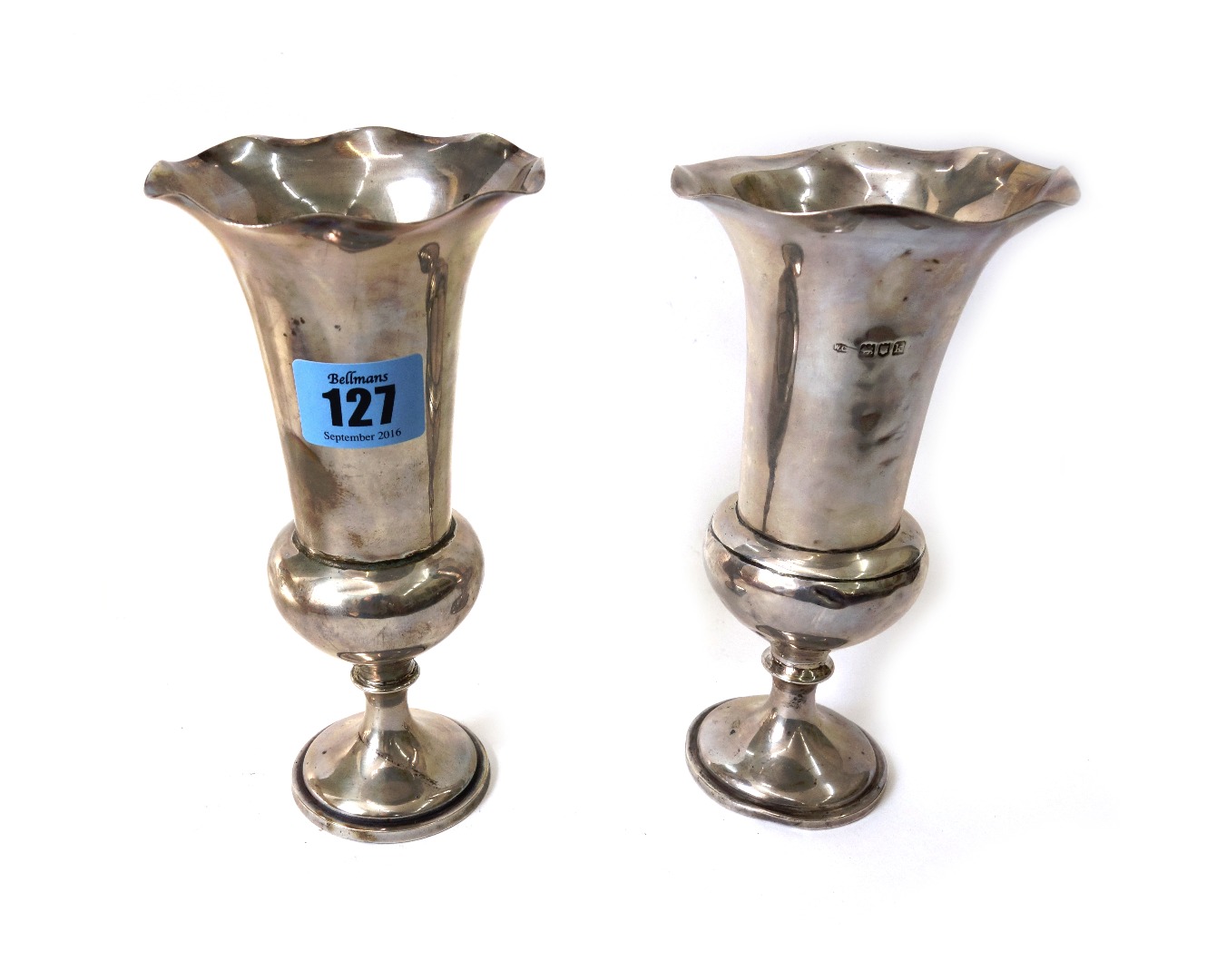 Appraisal: A pair of Edwardian silver trumpet shape flower vases William