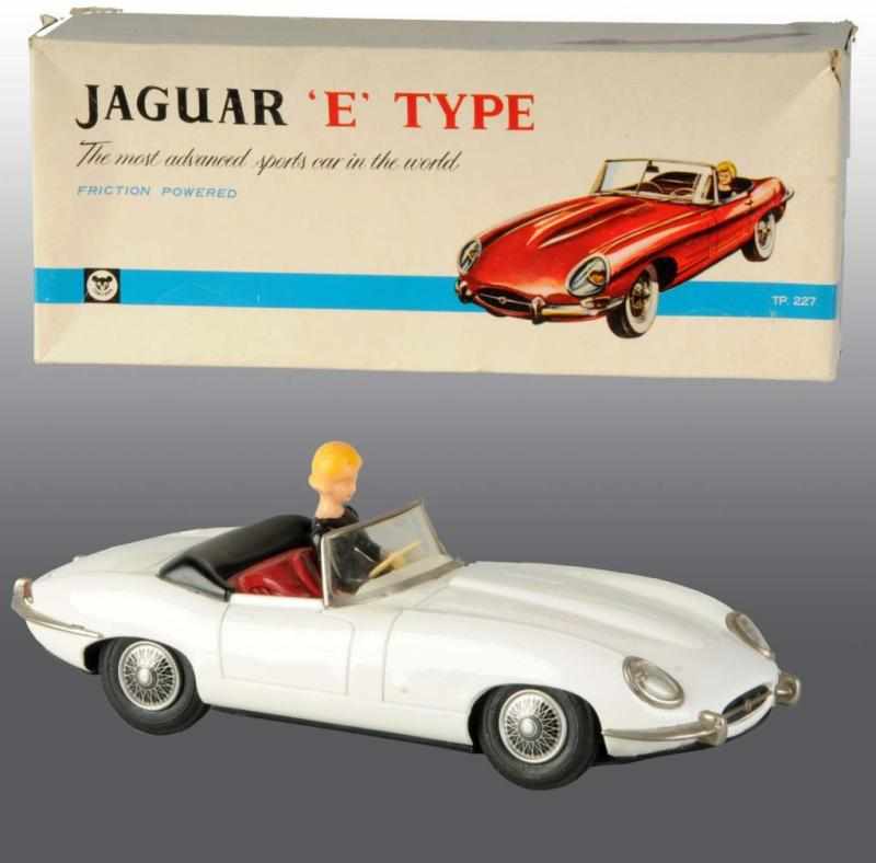 Appraisal: Tin Jaguar E Car Friction Toy Description Japanese Made by