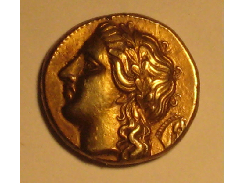 Appraisal: ANCIENT GREEK GOLD STATER Female head bow staff with inscription