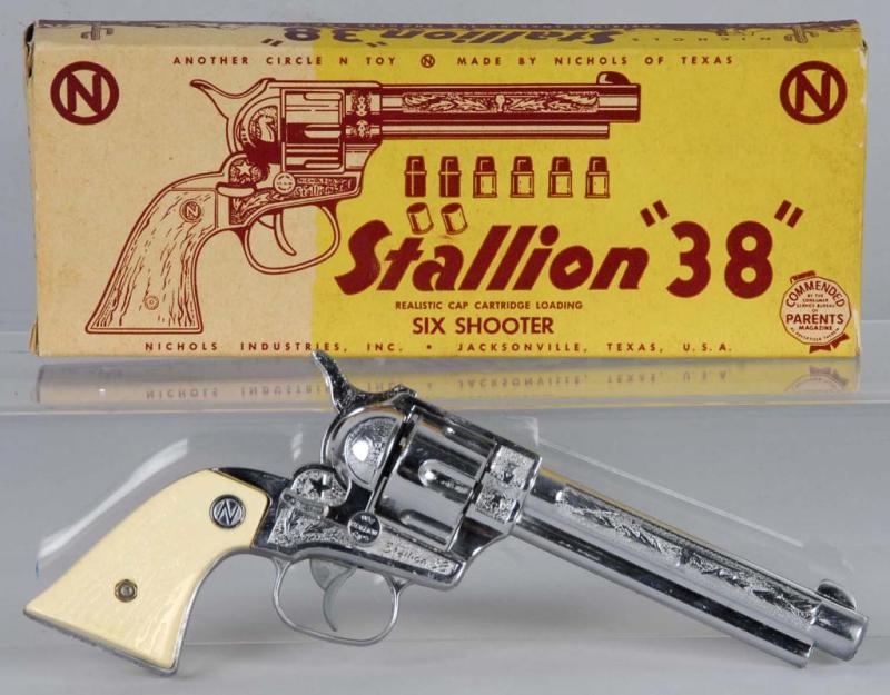 Appraisal: Nichols Stallion Cap Gun Description Cylinder revolves when fired Includes